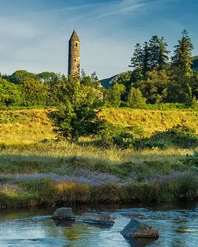 Round tower and monastic ruins at Glendalough in County Wicklow